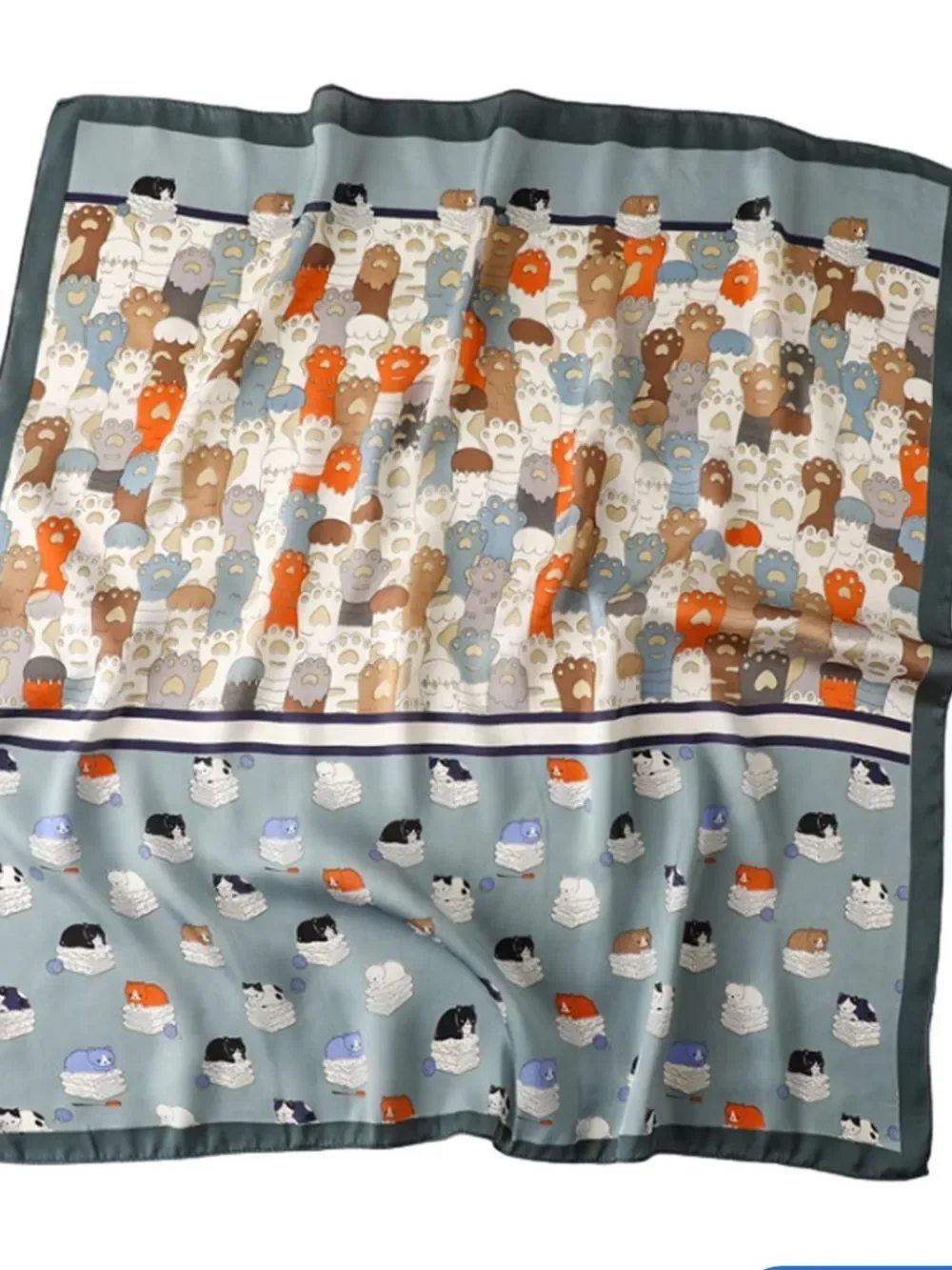 Playful Cat Paw Scarf in Orange & Navy feels like silk is polyester